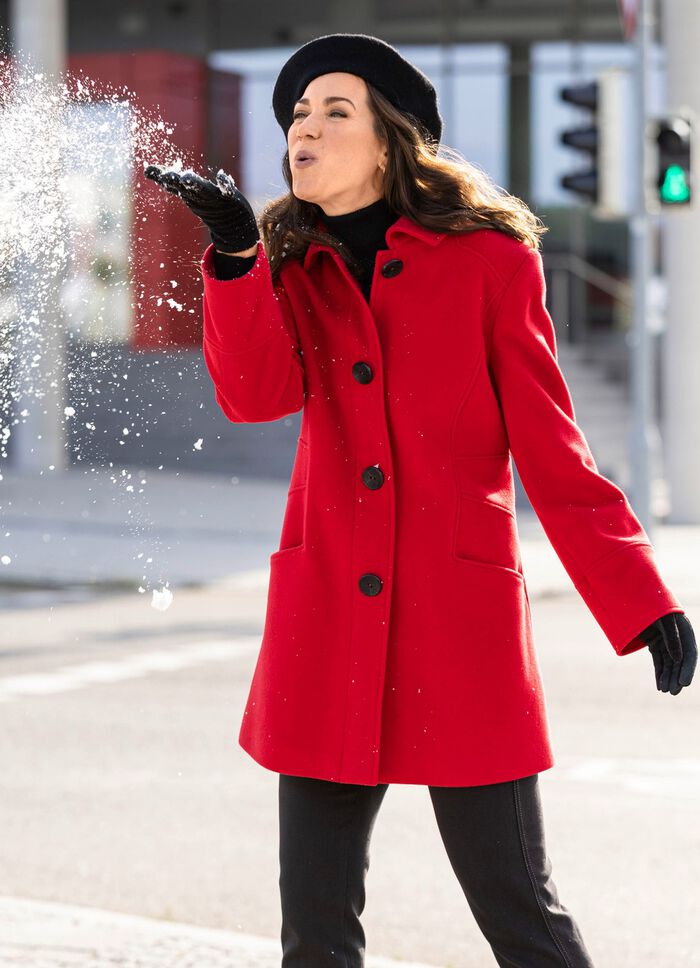 L&aring;ng jacka med snyggt dold knappsl&aring; 