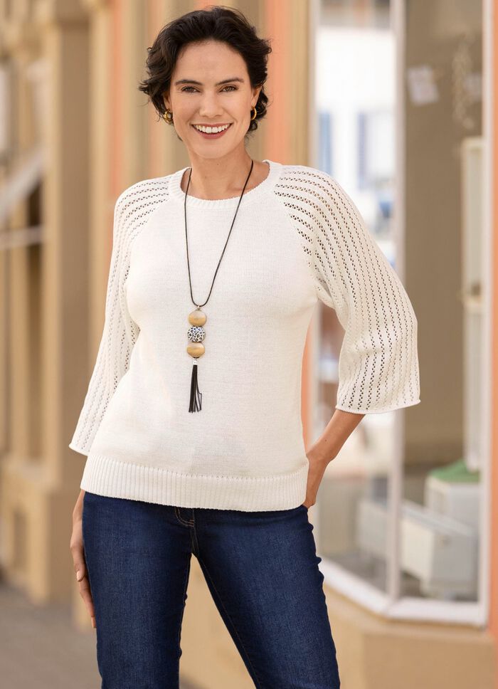 Tr&ouml;ja med raglan&auml;rmar i Ajourdessin 