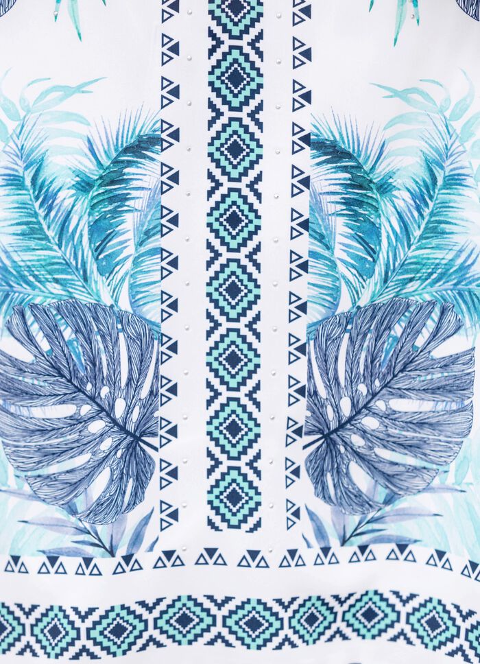 Skjorta med silverf&auml;rgade dekorativa tallrikar 