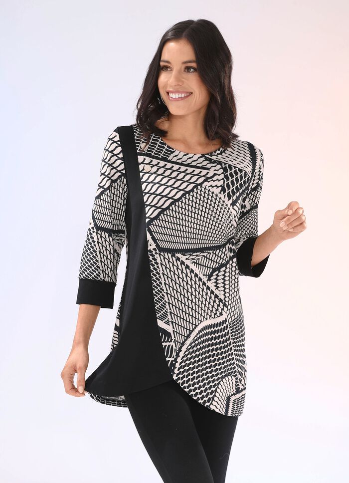 Lång skjorta med dekorativa knappar på höger fram 