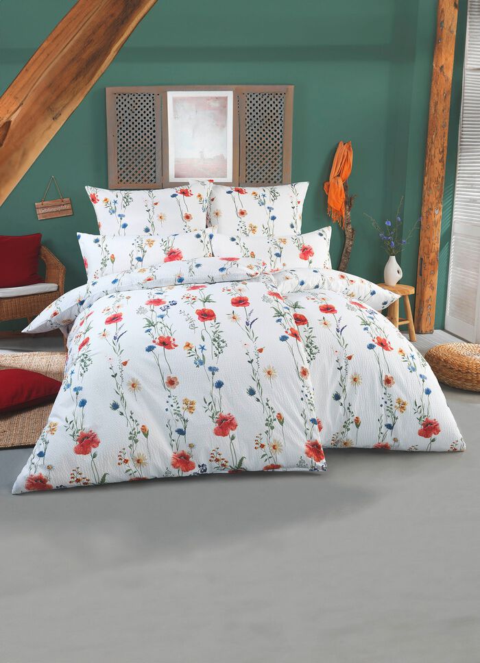 S&auml;ngkl&auml;der set tryckt p&aring; b&aring;da sidor 