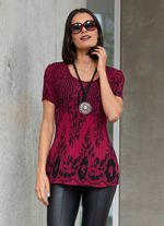 Tunika med kanttryck 