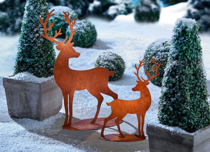 R&aring;djurssilhuetter av rostig st&aring;lpl&aring;t 