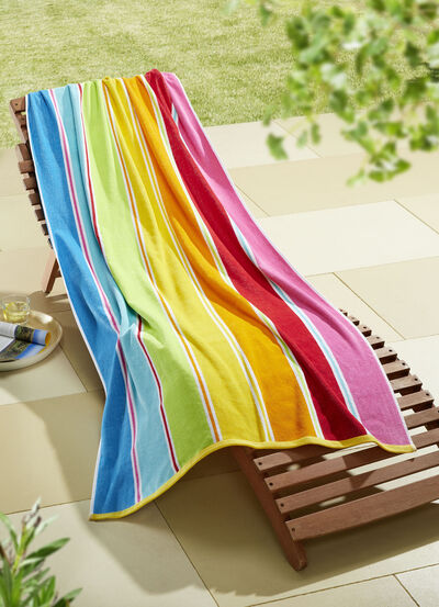 Strandhandduk i velour med extra absorberande baksida  Strandhandduk i velour med extra absorberande baksida