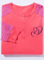 F&ouml;rpackning om tv&aring; nattlinnen med sidoslitsar och knappsl&aring; 