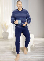 Pyjamas i stretchig frotté med muddar i ärmsluten, 