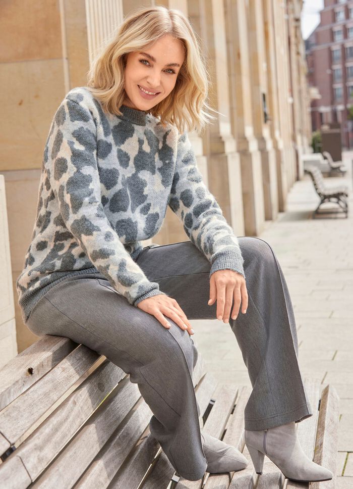 Byxor med res&aring;r i midjan baktill 