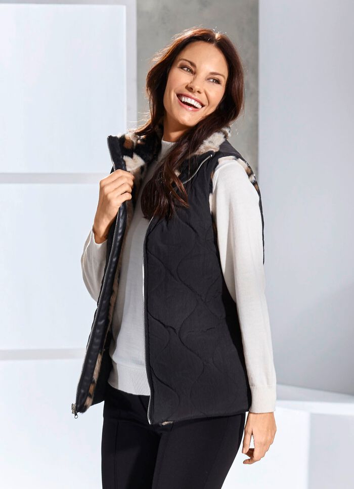 V&auml;ndbar v&auml;st med dragkedjef&ouml;rsedd kn&auml;ppning 