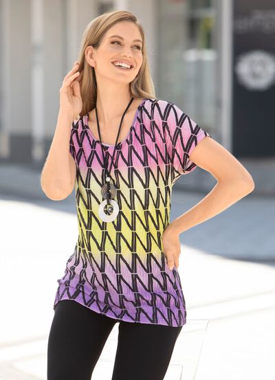 Topp med &ouml;verdimensionerat axelparti 