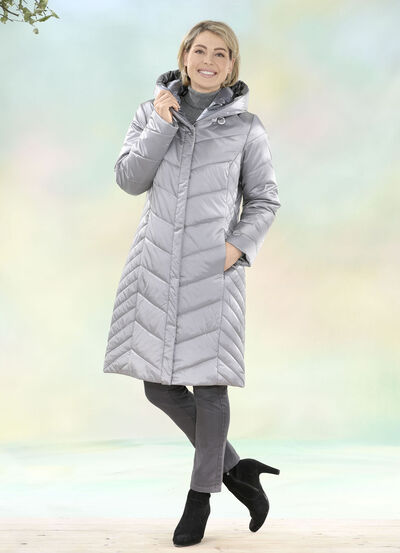 Kappa med p&aring;satt huva 