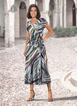 kl&auml;nning med sofistikerad knytteknik 