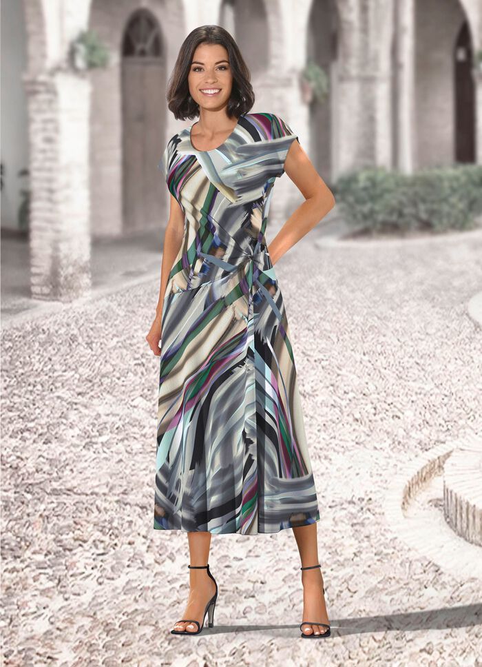 kl&auml;nning med sofistikerad knytteknik 