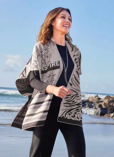 Poncho med elegant jacquarddesign 