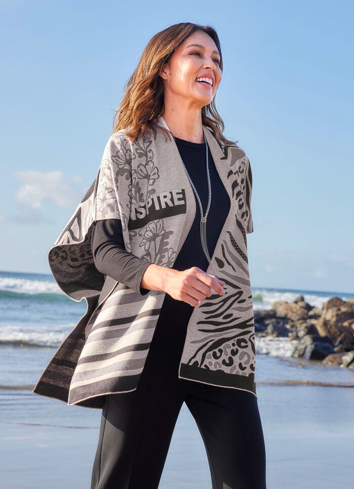 Poncho med elegant jacquarddesign 