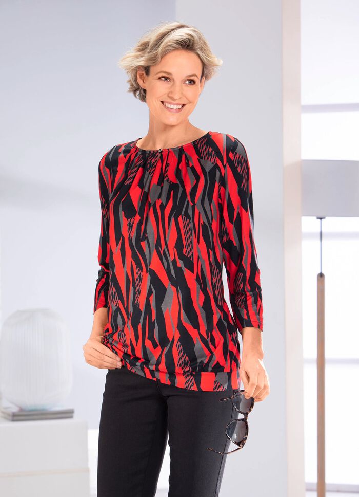 Skjorta med &ouml;gleknappst&auml;ngning 