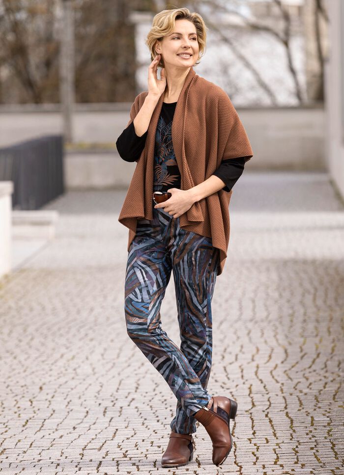 Byxor med res&aring;rinf&auml;llningar bak 