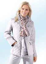 Jacka med kontrastf&auml;rgad piping 