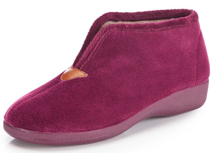 Laurina tofflor tillverkade av sammetslena textilmaterial 