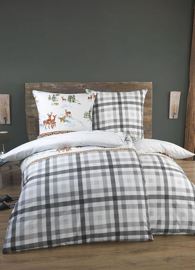 Sängkläder med idyllisk vinterdesign 