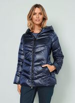 Quiltad jacka med fast huva 