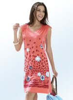 Tv&aring;delad kl&auml;nning med placerat tryck och nedhasad &auml;rm 