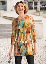 stickad tunika i finstickad 