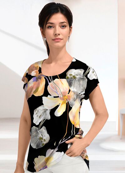 Skjorta med neds&auml;nkta axlar 