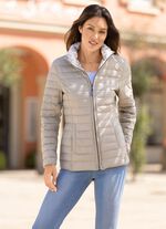 Funktionell v&auml;ndbar jacka med blomm&ouml;nster 