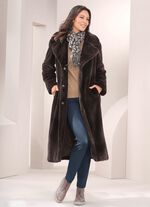 Kappa gjord av gosig mjuk fuskp&auml;ls 