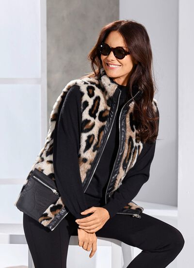 V&auml;ndbar v&auml;st med dragkedjef&ouml;rsedd kn&auml;ppning 