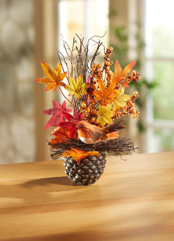 H&ouml;stens arrangemang i en konkruka 