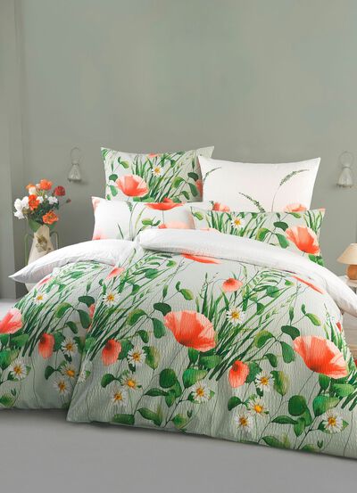 S&auml;ngkl&auml;desset med tryck p&aring; b&aring;da sidor i seersucker-kvalitet 