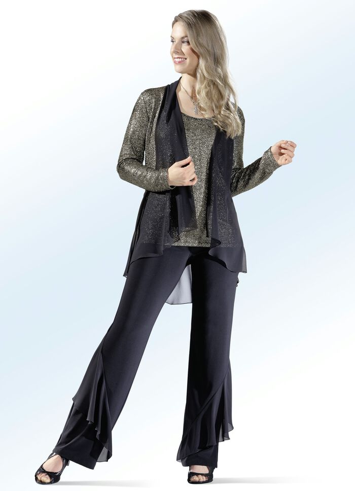 Byxor med effektfulla volanger 