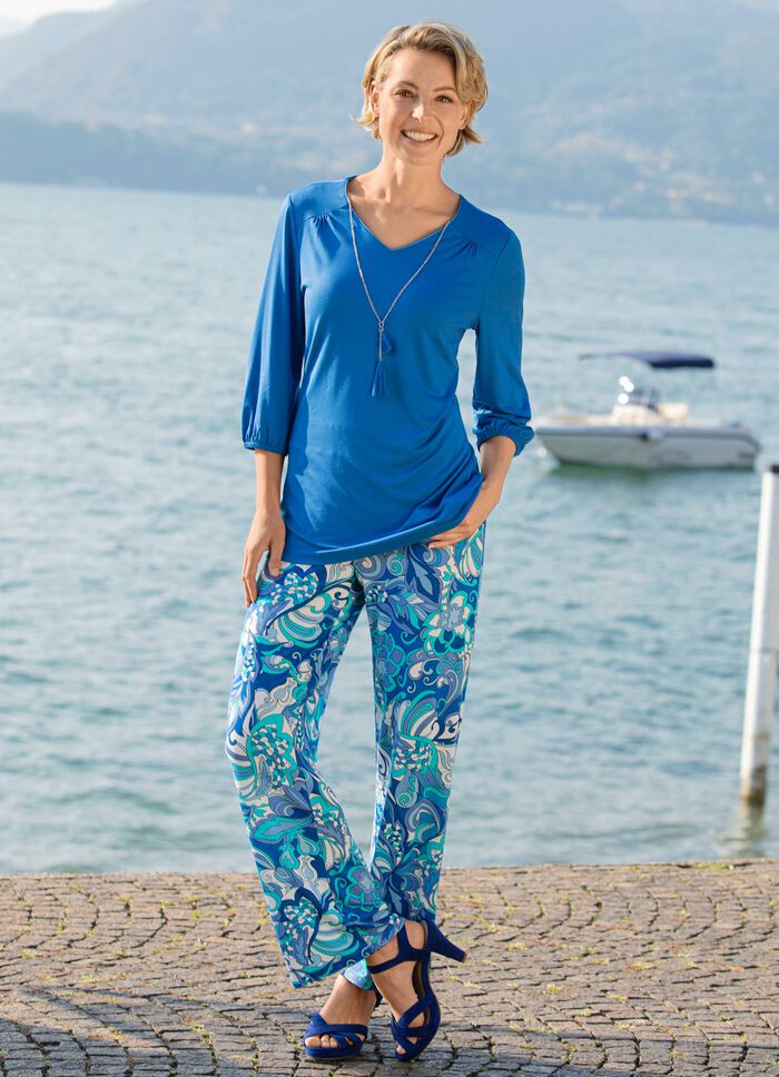 Byxor med briljant f&auml;rgat bl&auml;ckstr&aring;letryck 