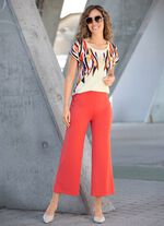 Topp med strass- och paljettdekor 