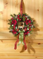 V&auml;ggkrans med julstj&auml;rnablommor 