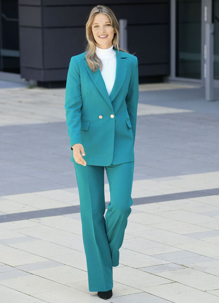 Byxdress med lapelkrage 
