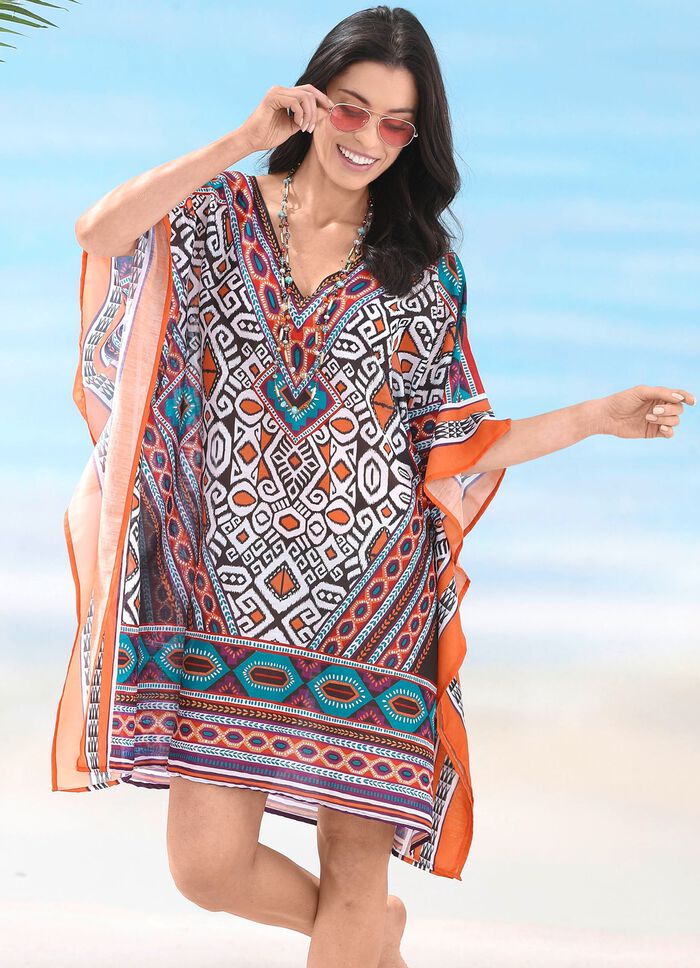 Sunflair-tunika med placerat tryck, l&auml;tt transparent 