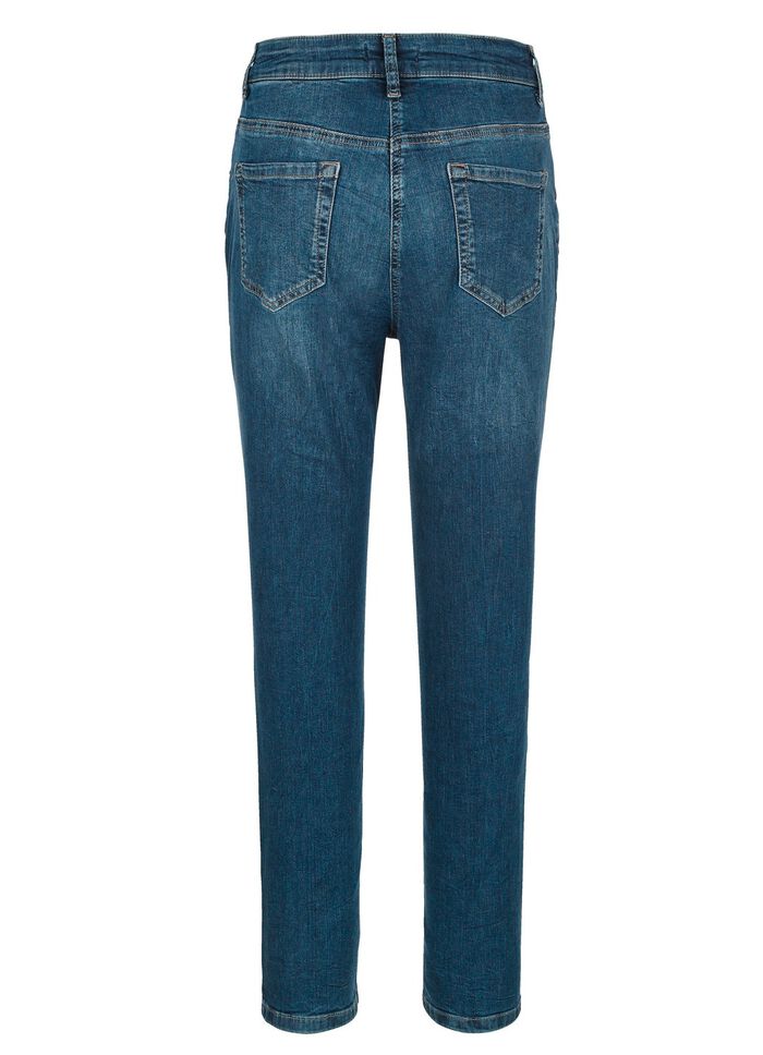 Jeans med trendig tv&auml;tt 