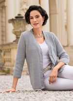 Kofta med subtila glittereffekter 