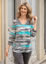 Skjorta med silverf&auml;rgade dekorativa tallrikar 