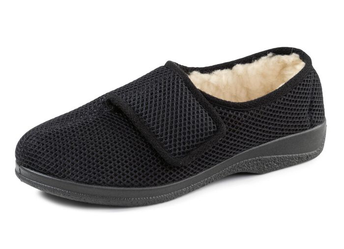 Tofflor gjorda av vadderat textilmaterial 