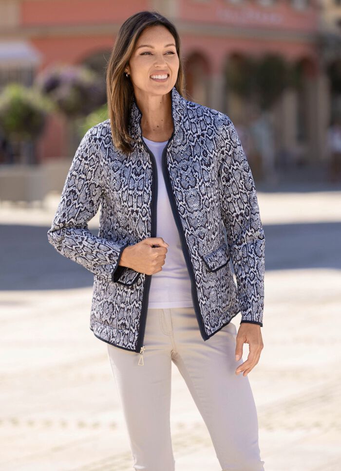 Funktionell v&auml;ndbar jacka med reptildesign 