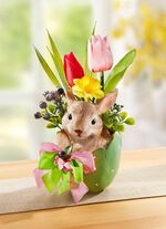 Tulpanarrangemang i en &auml;ggvas 