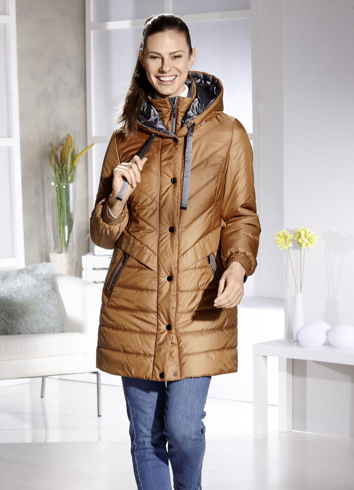 Kort kappa med v&auml;stinl&auml;gg 