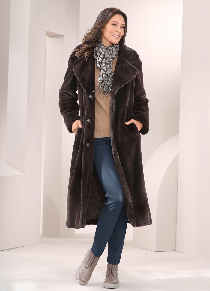 Kappa gjord av gosig mjuk fuskp&auml;ls 