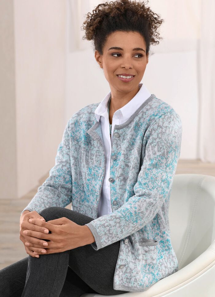 Kofta med dekorativa knappar 