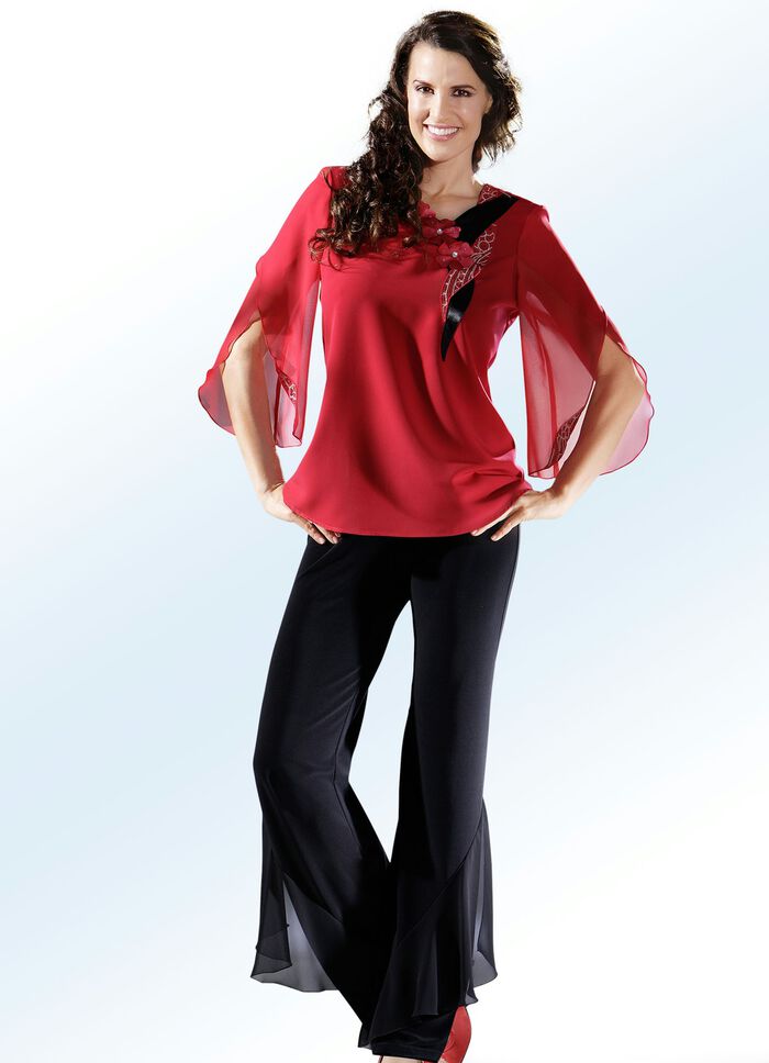 Byxor med effektiva volanger SVART