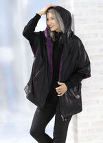 Funktionell vändbar cape i en oversized look 