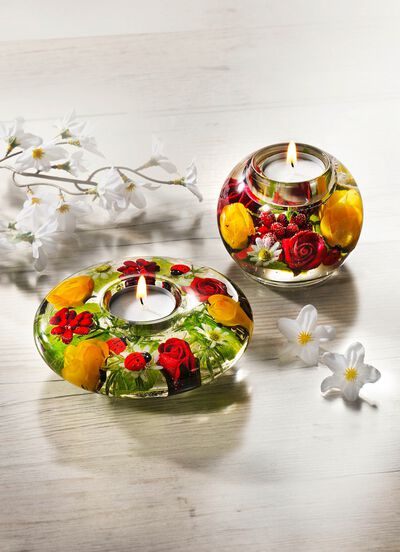 V&auml;rmeljush&aring;llare med v&auml;rmeljus 